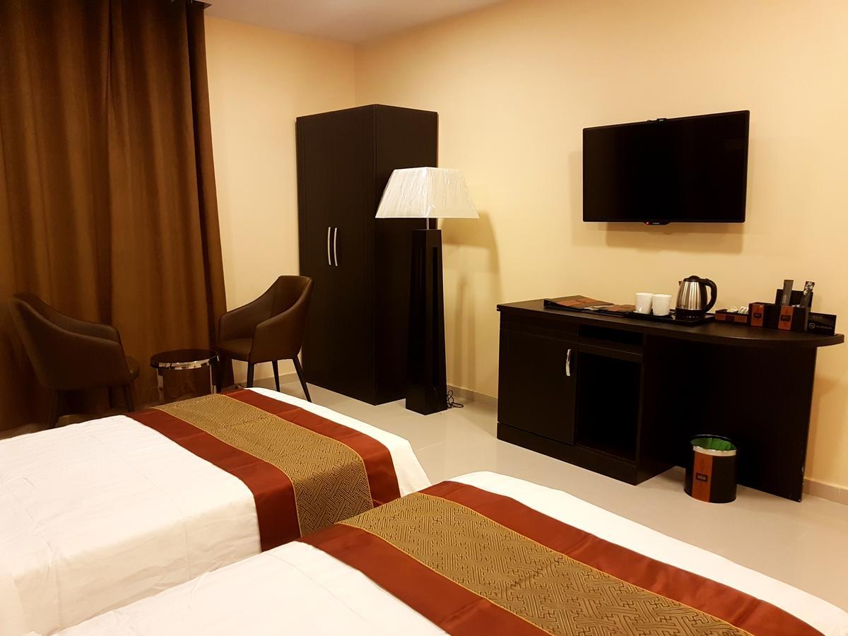 Tanuf Residency Hotel Низва Екстериор снимка